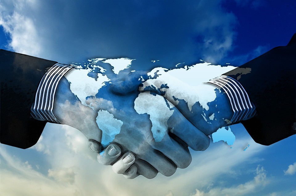 Handshake indicating new opportunities and agreements after Brexit