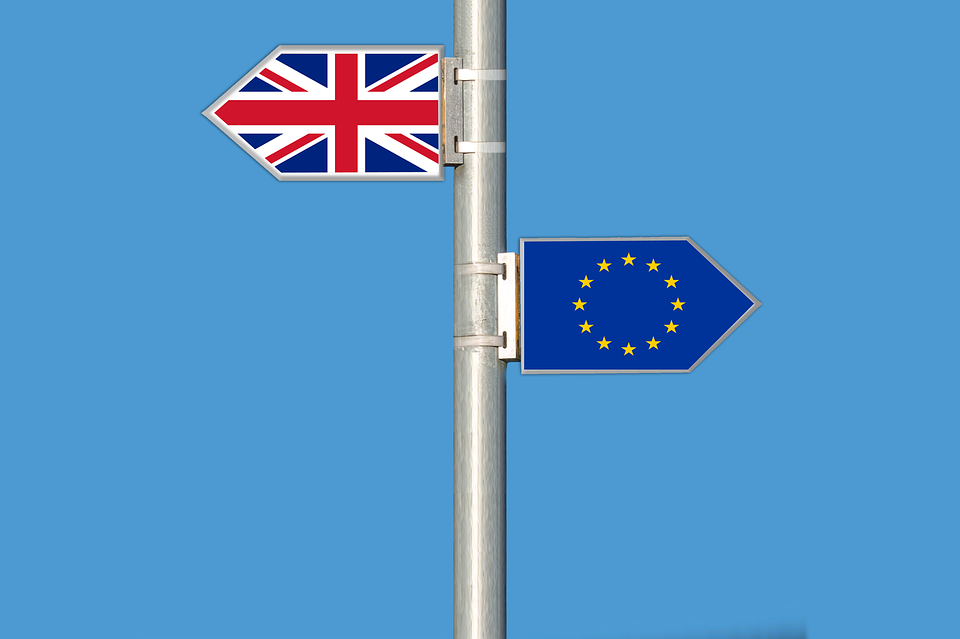 British and European flag on a pole pointing in opposite directions after Brexit
