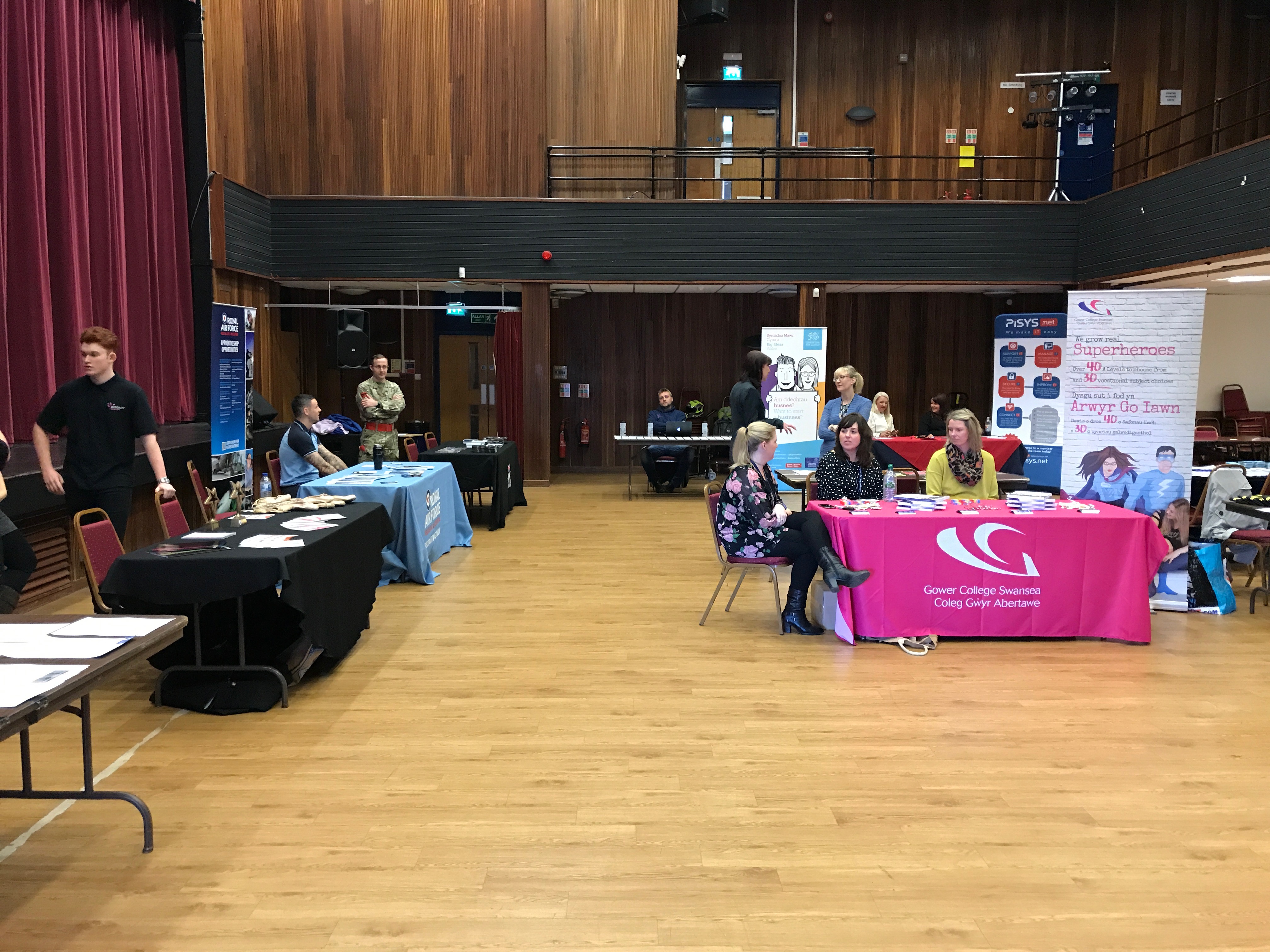 An image taken from Penyrheol Comprehensive School's Careers Fair. Image includes stalls from Gower College and other local businesses.