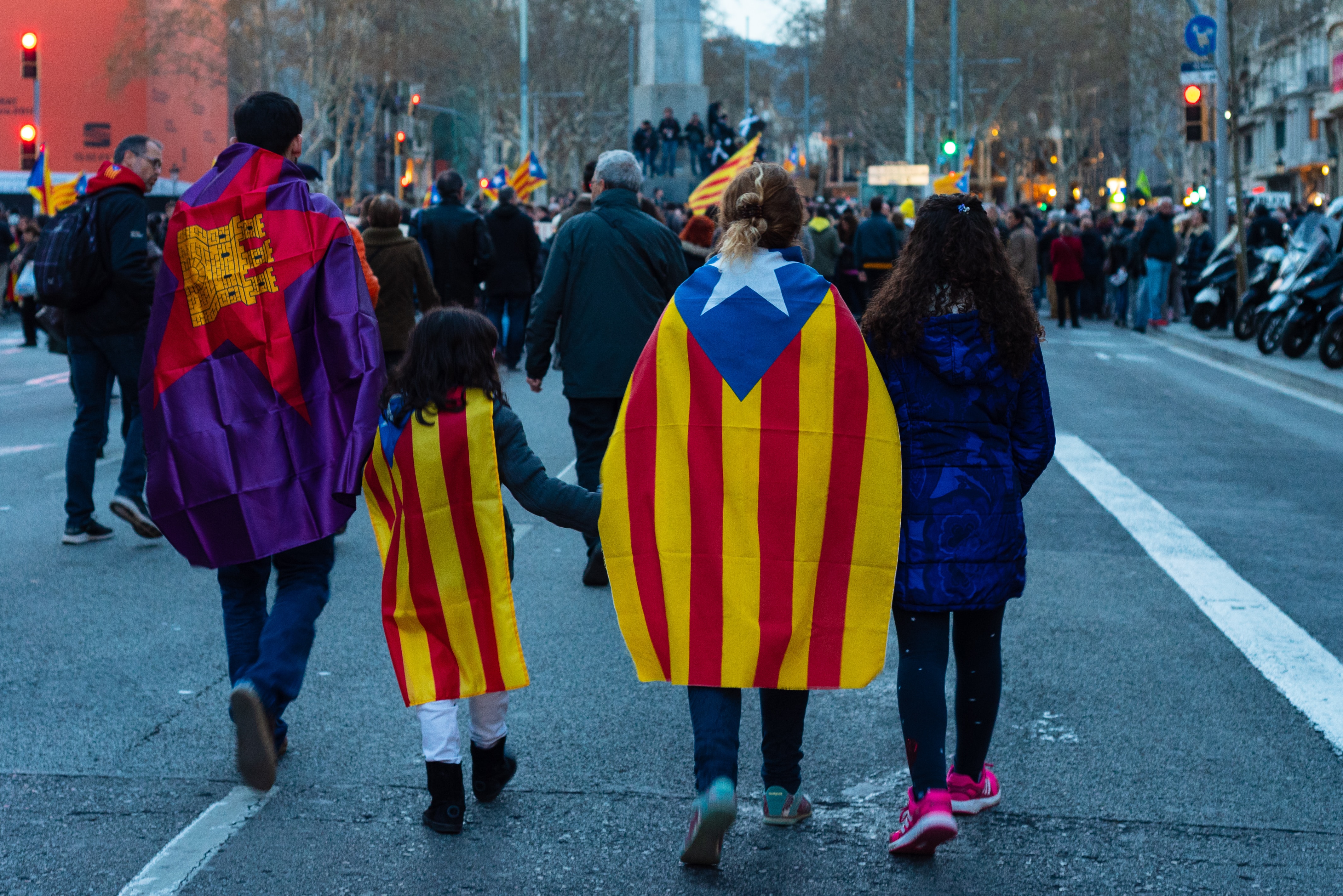 Family wearing Catalan flags