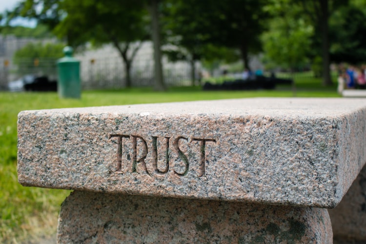 Bench with the word 'Trust' engraved